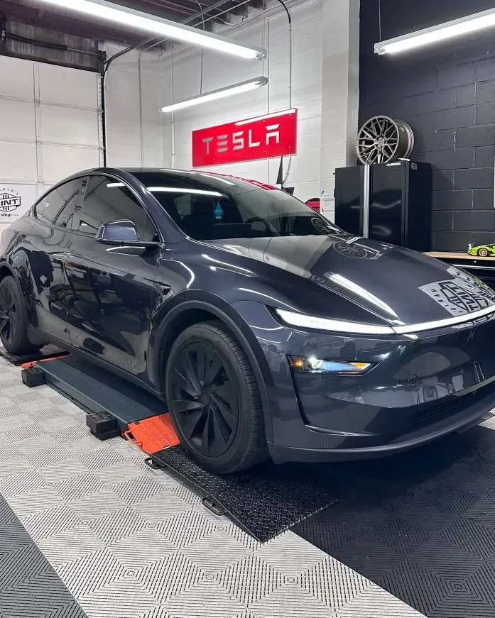 Tesla Model Y in the bay at Mario's Tint Shop