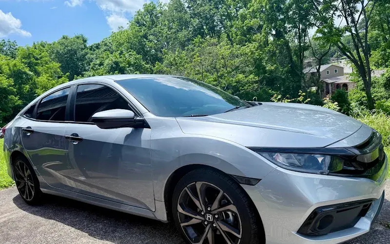 Chase's silver Honda Civic with tinted windows